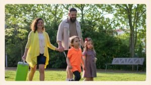 A calm mature woman navigating blended family relationships in a warm home setting